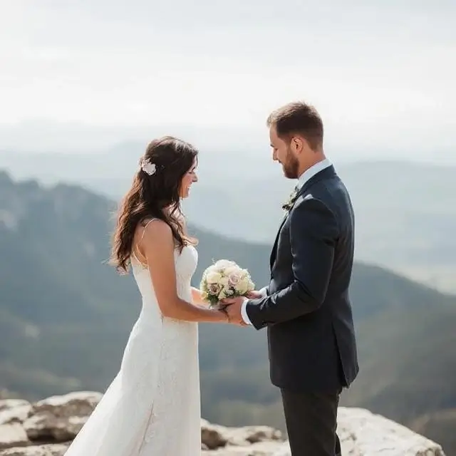 An intimate elopement ceremony on a mountaintop.