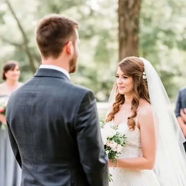A groom sees his bride for the first time.